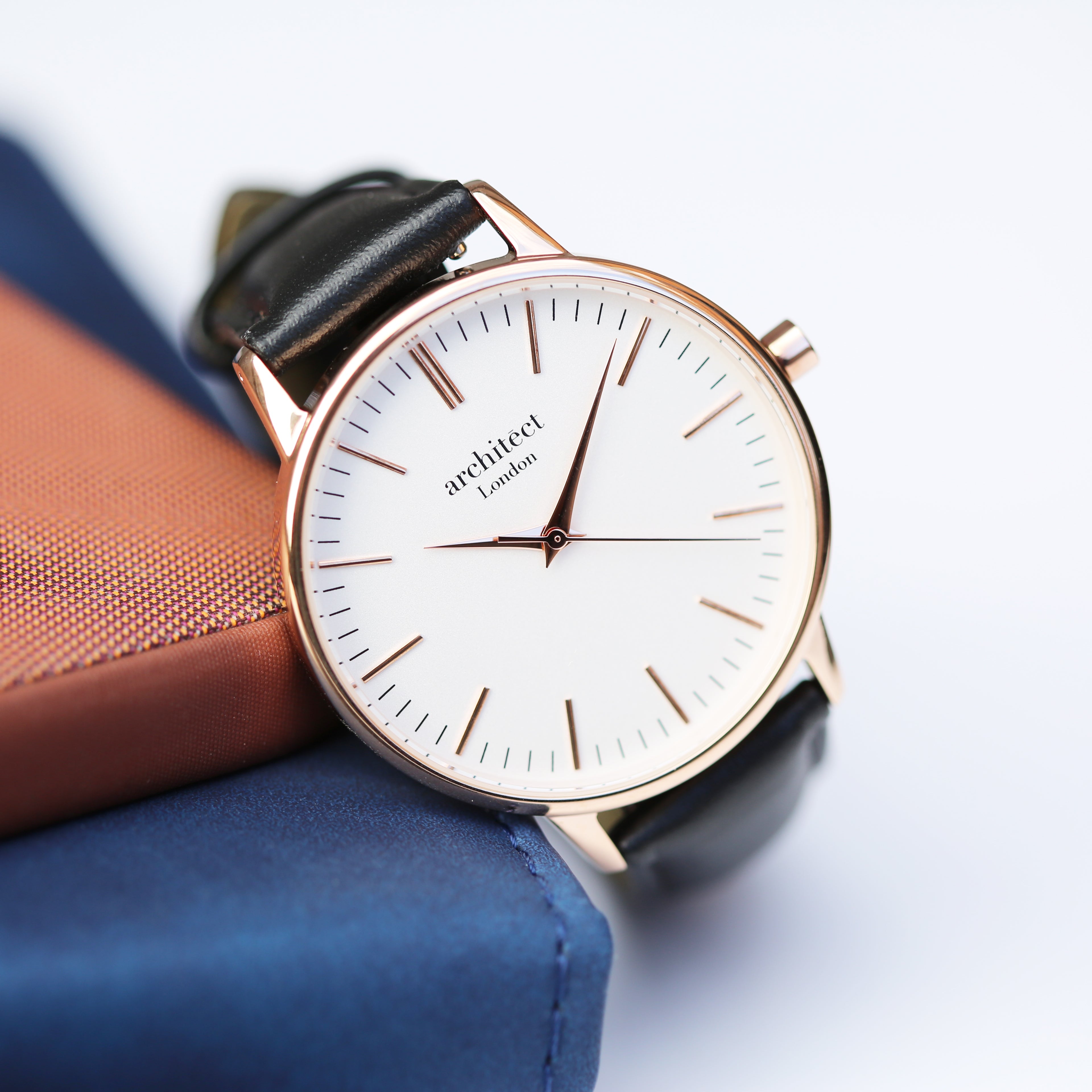 Personalised ladies rose gold Blanc watch with black leather strap in lifestyle setting