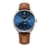 Watch with brown leather strap and blue dial on a white background